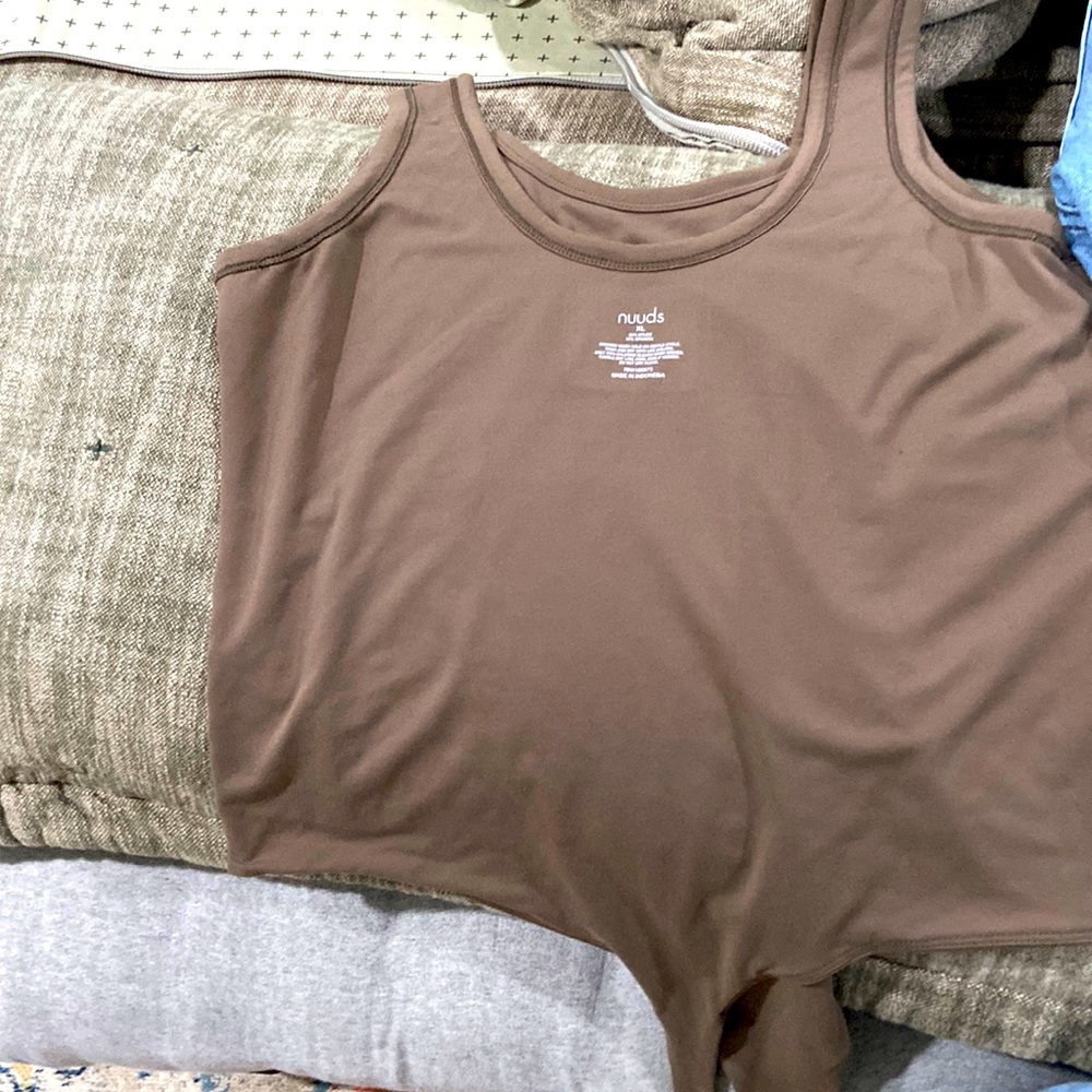 Nuuds body suit mocha xl.  Need a large has been washed thinking it would shrink